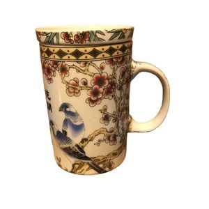 Chinese porcelain tea cup with removable strainer